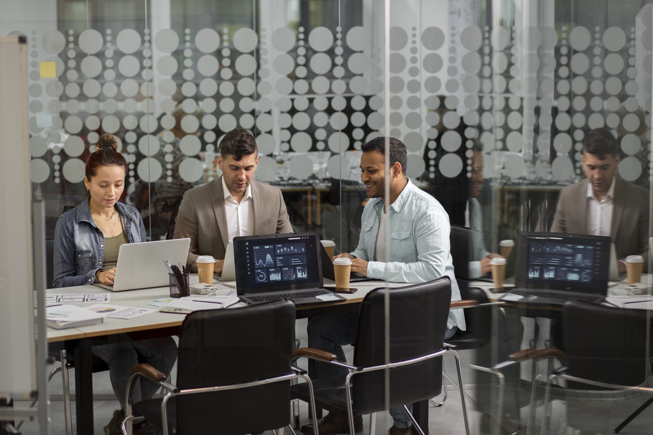 IT professionals monitoring and managing modern infrastructure